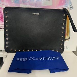 Rebecca Minkoff black clutch with silver studs.